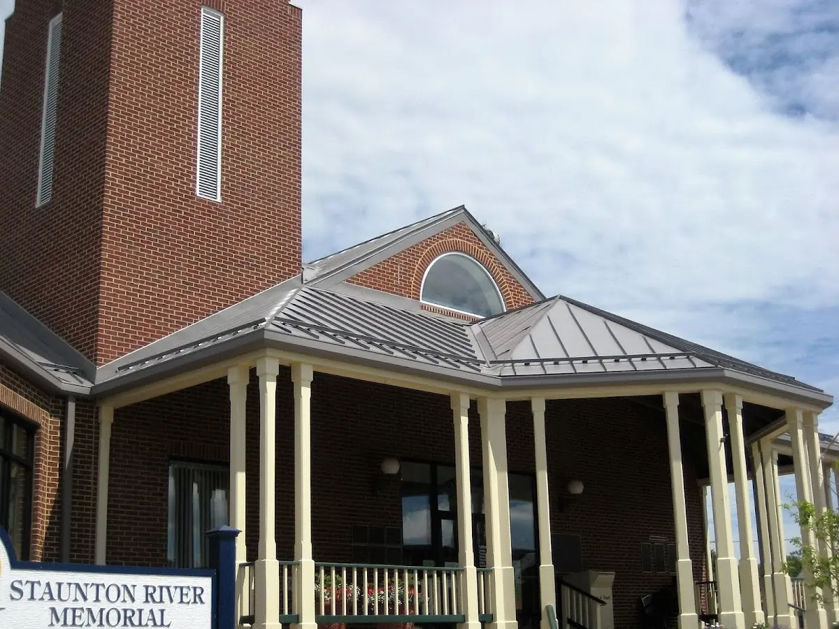 Skilled roofing craftsmen working on a residential roof in Yukon